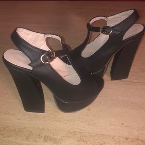Black. Sexy, high heeled platforms.
